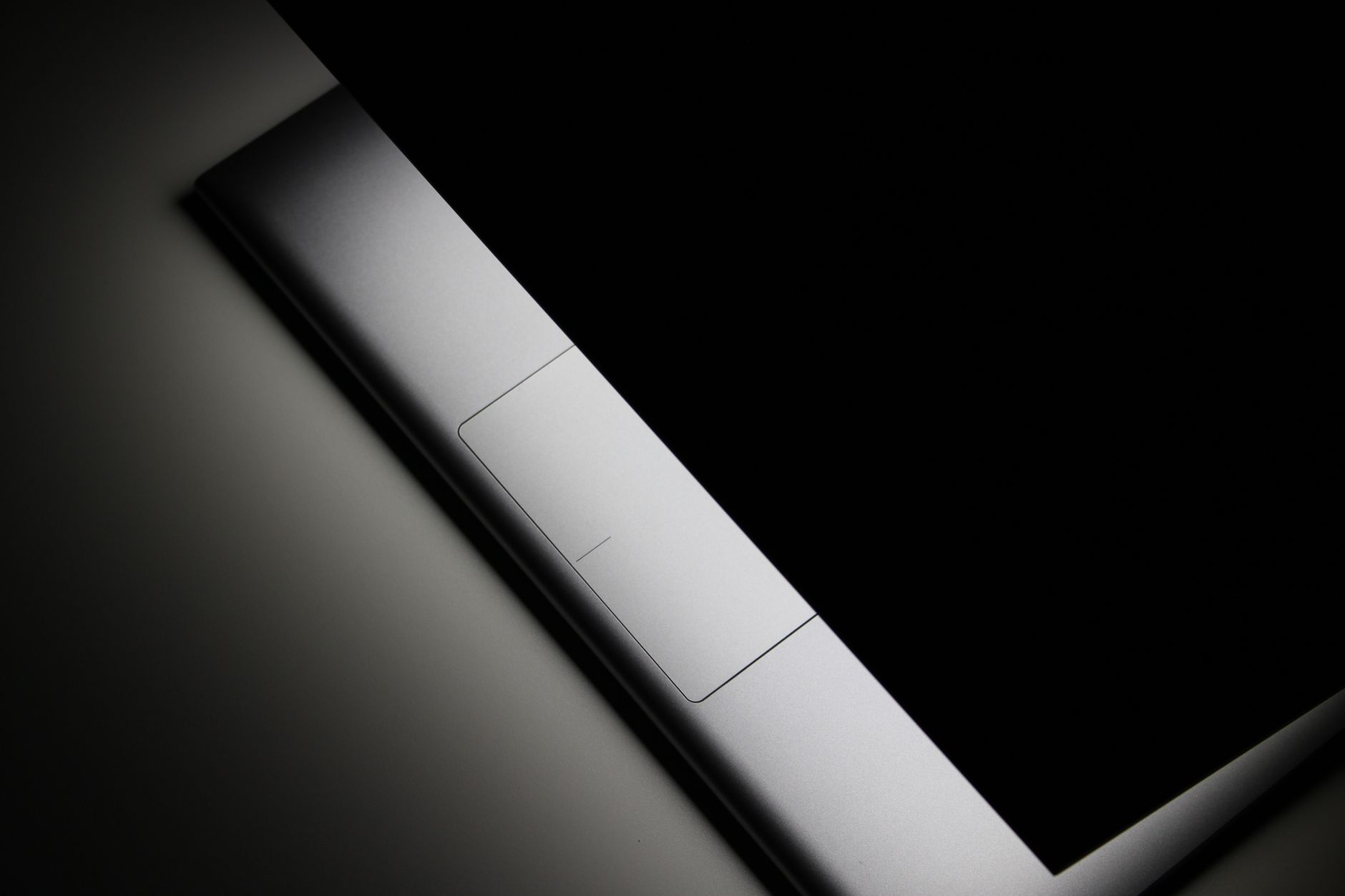 Close-up of a durable laptop hinge design.