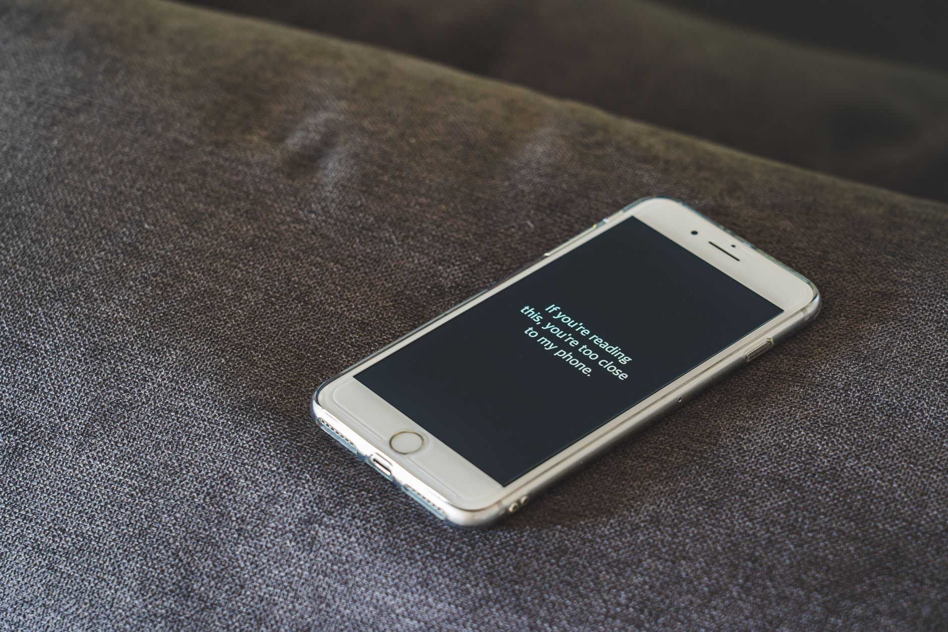 Smartphone with a minimalist home screen.