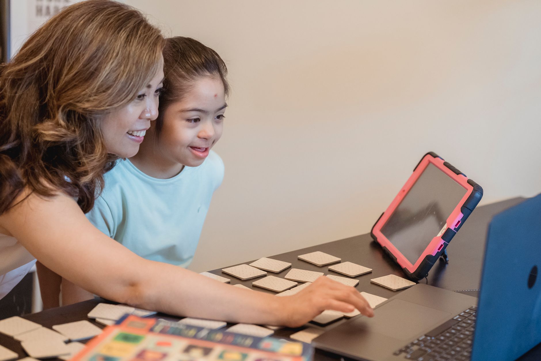 A parent and child engaging in offline discussion about digital habits.