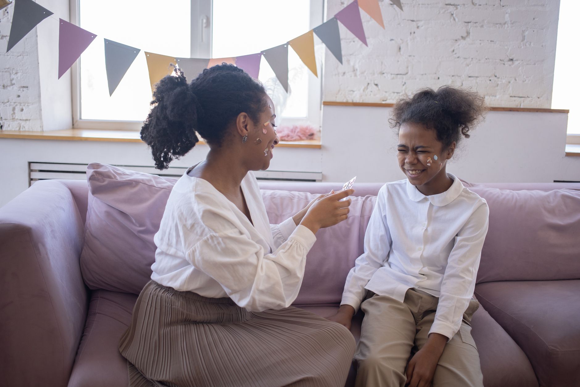 A parent and their child having a calm conversation at home.