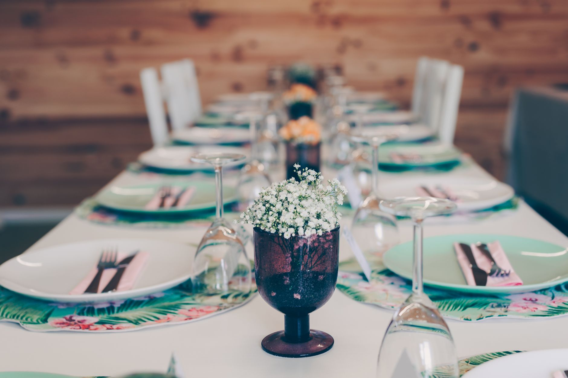 An elegantly set dinner table for a staycation meal.