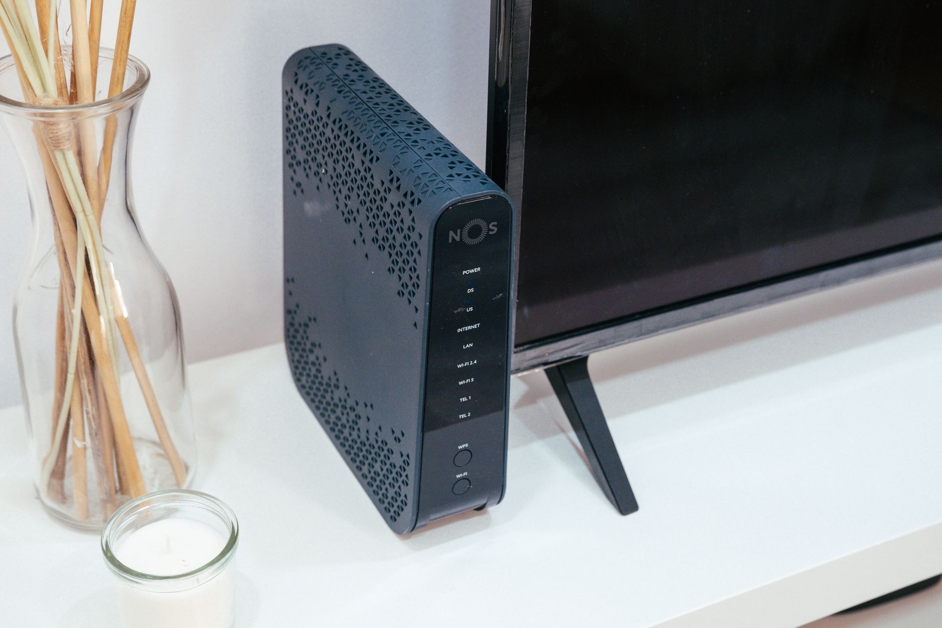 An organized home network setup with a router and smart devices.