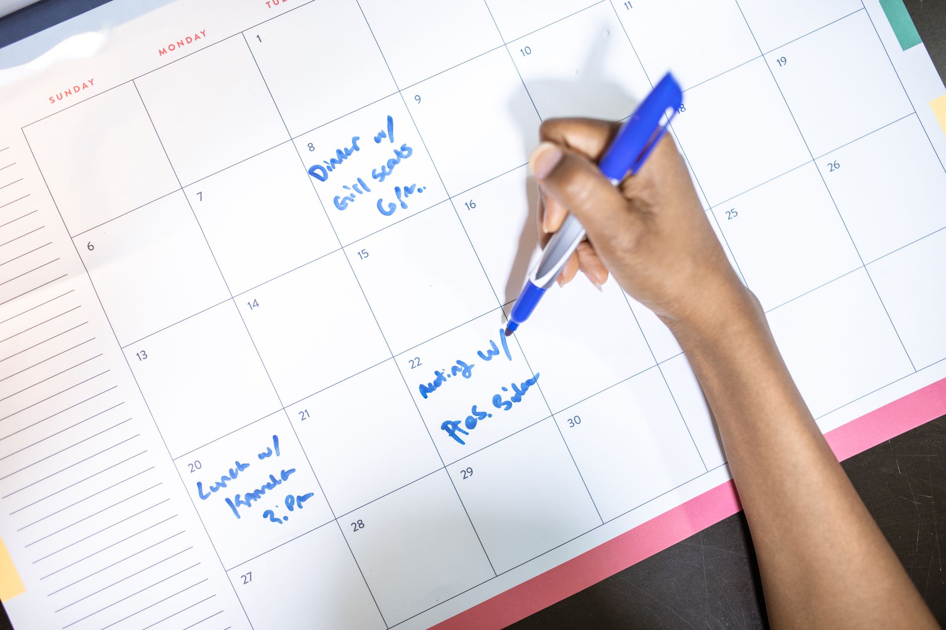 A family calendar used for tracking schedules and setting boundaries.