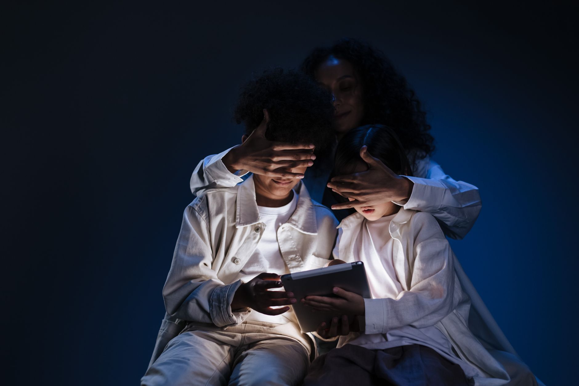 A conceptual digital vault protecting family devices.