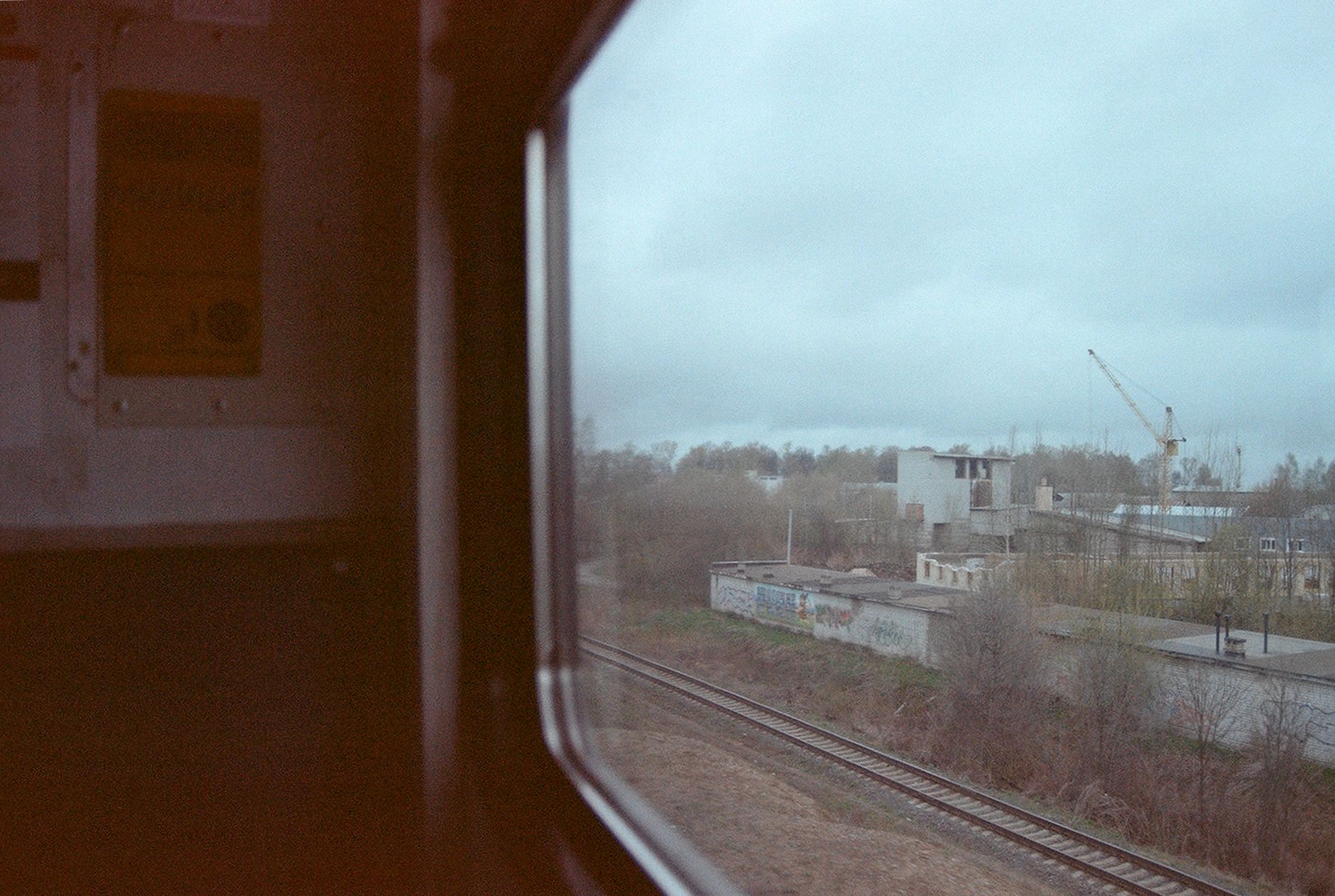View from a train window during a quiet travel period.