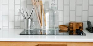 Eco-friendly household items arranged neatly on a kitchen counter.