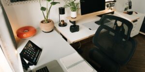 A minimalist home office desk setup representing digital organization and security.