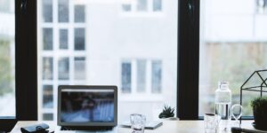 A clean, modern workspace setup representing the blend of traditional study and digital learning.
