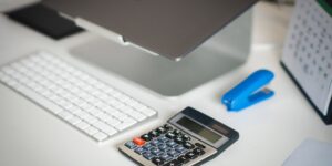 A clean, modern home office space representing financial planning and household management.