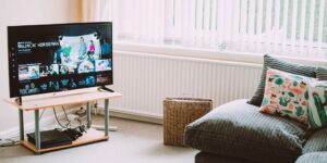 A modern, bright living room representing the integration of digital public services into family life.