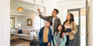 Family checking alarms on arrival at a vacation rental