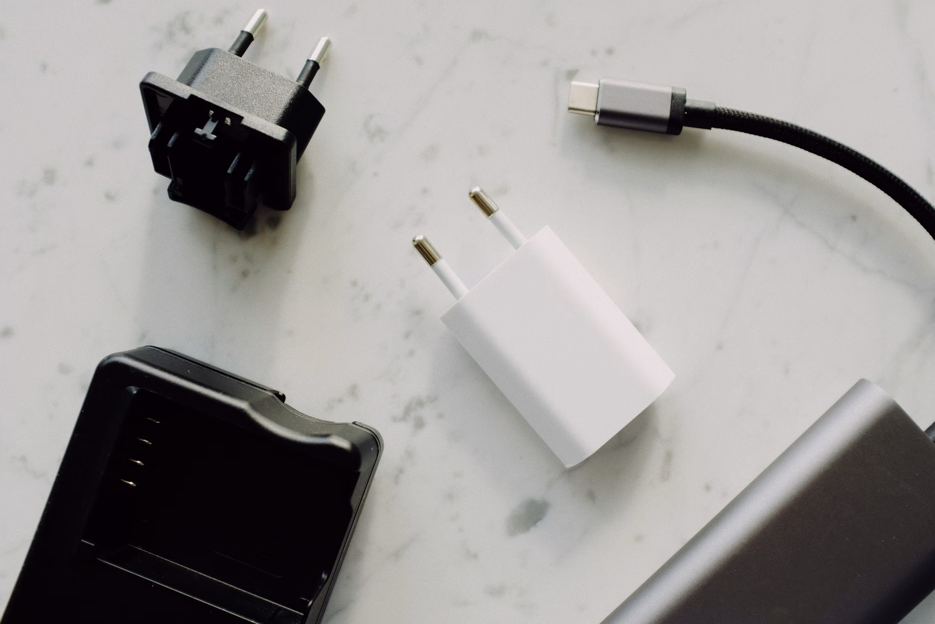 Close-up comparison of USB-C connector pins and cable heads.