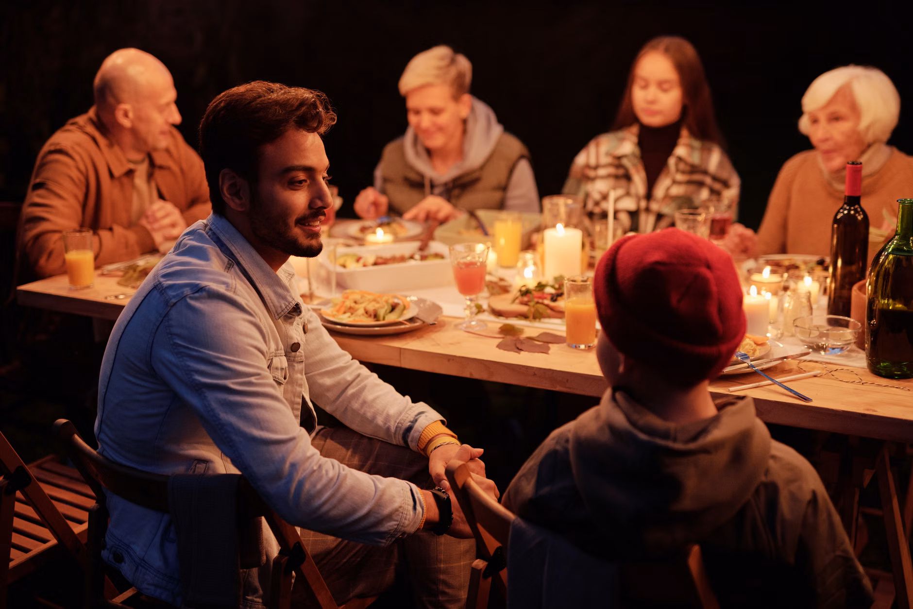 A family enjoying a quiet evening in a temporary rental home.