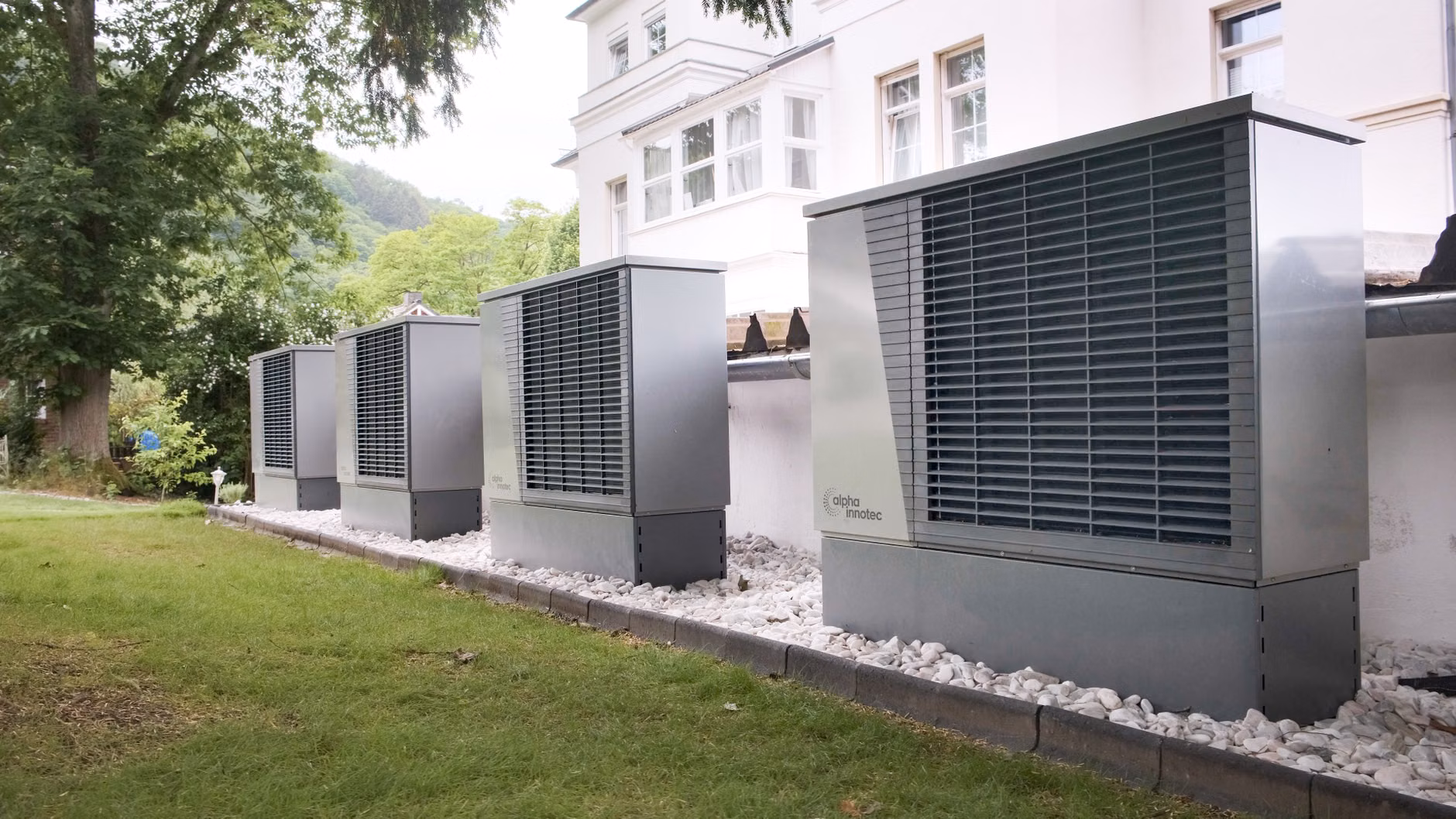 A modern outdoor heat pump unit for residential heating.