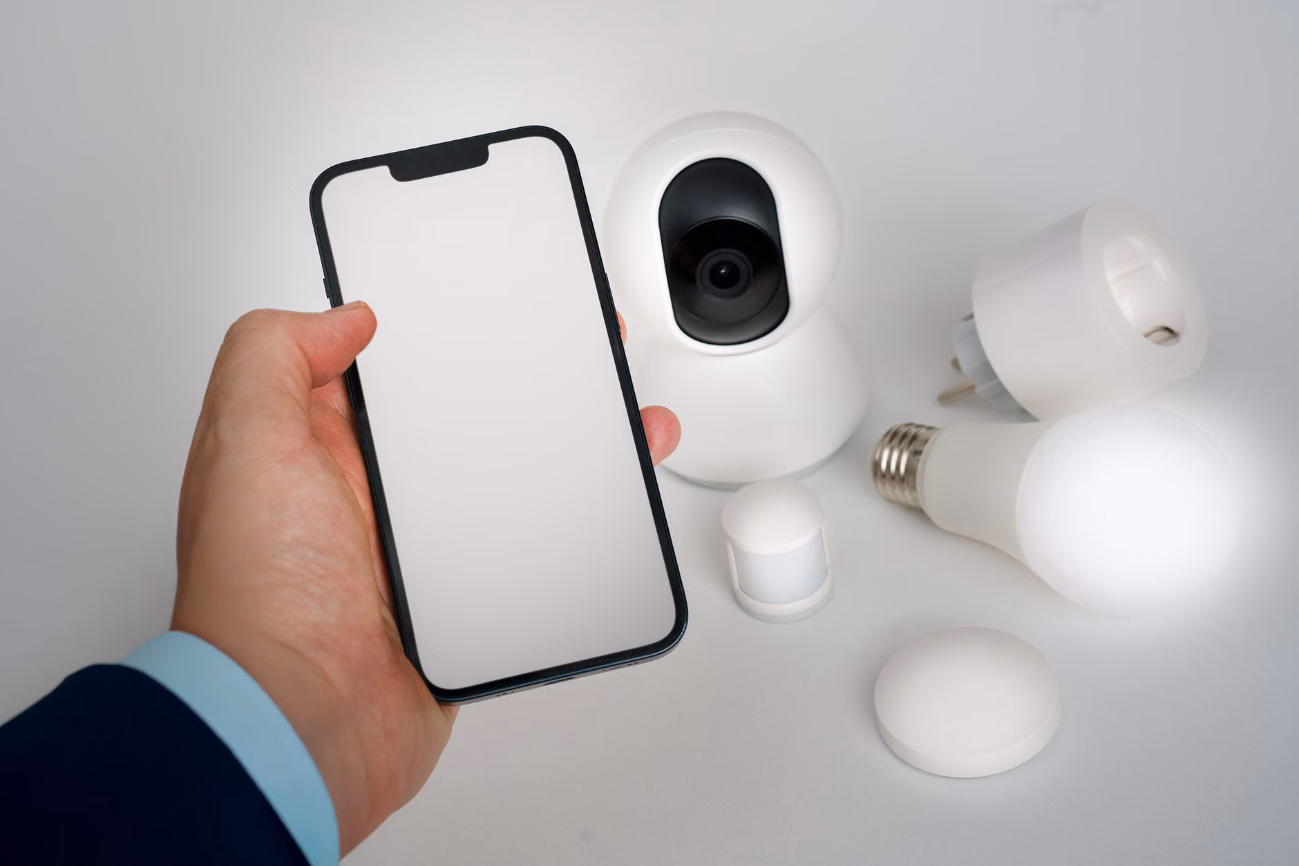 User managing smart home device security on a tablet.