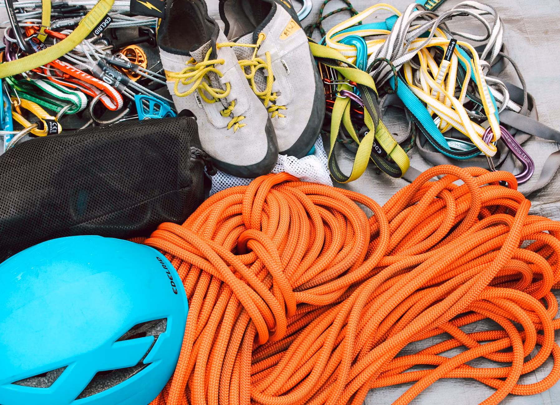 An organized collection of essential gear for a mountain retreat.