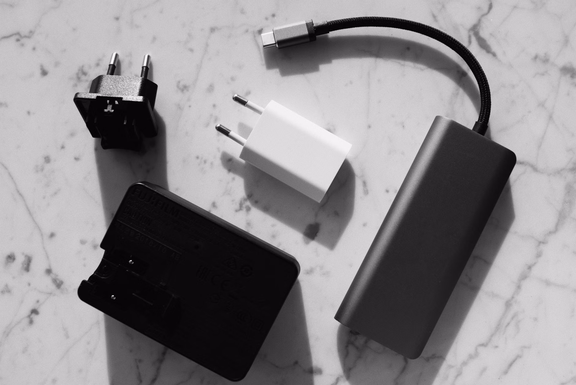 Organized collection of charging cables and power adapters for safe hardware inspection.