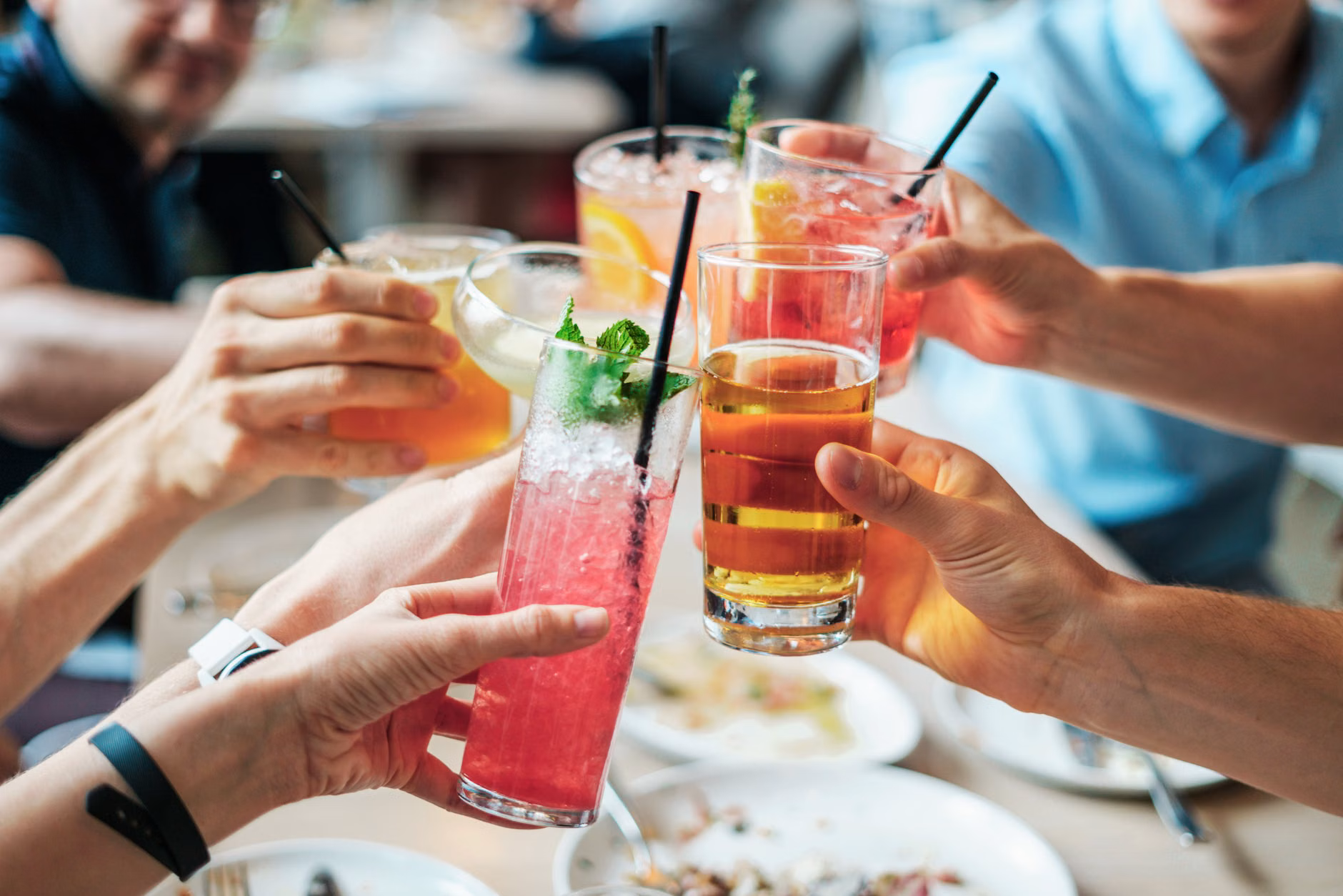 A group of friends enjoying mocktails at a social gathering.
