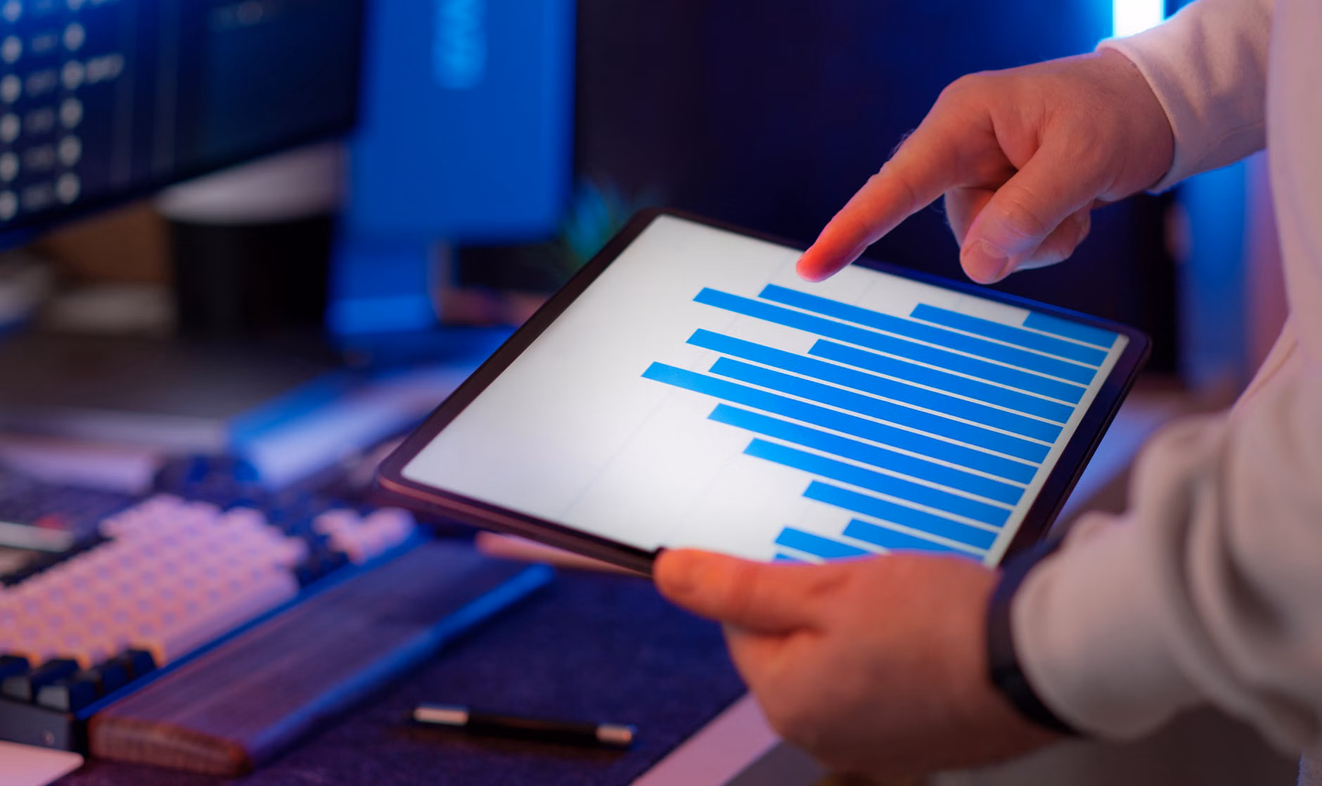 A family reviewing energy efficiency data on a tablet.