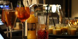 A sophisticated selection of non-alcoholic drinks on a kitchen counter.