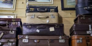 A clean, organized collection of travel gear representing the second-hand market.