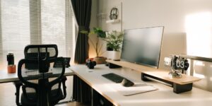 A clean, modern home office workspace representing balance.