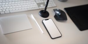 A clean desk setup with various family devices showing organized tech management.