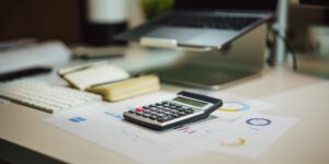 A clean, organized desk setup for financial planning and subscription management.