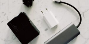 A collection of modern electronic devices organized with USB-C cables.