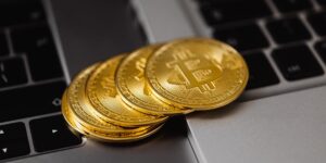 A hardware wallet on a desk symbolizing secure financial planning for a child's education.