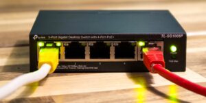 A modern home router setup in a clean office environment.