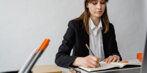 An adult focusing on learning a new skill in a peaceful setting.