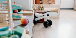 A minimalist and functional child's play area in a small living room.