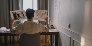 A professional planning a career break in a home office.