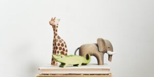 A curated collection of educational toys in a modern living room setting.