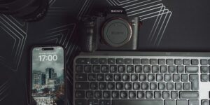 Minimalist home office setup with a face-down smartphone, symbolizing digital disconnection.