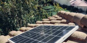 A bright, modern house representing the benefits of community solar energy.