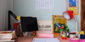 A quiet, organized study space for a student with a desk lamp.