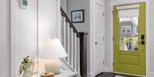 A modern smart thermostat in a cozy home setting representing energy management.