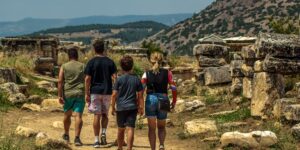 A family preparing for a history walk in a historic neighborhood.