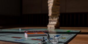 A warm, inviting family board game setup on a wooden table.