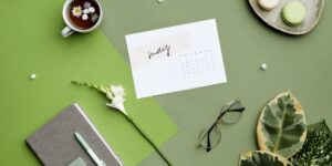 A peaceful workspace setup with a journal and natural elements.