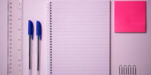 A minimalist, organized desk setting for couples to practice emotional journaling.