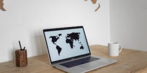 A clean, modern workspace with a world map, representing international tax planning.