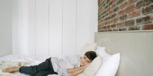 A calm, minimalist bedroom designed for sensory regulation and restful sleep.