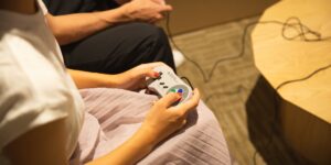 A cozy, modern living room featuring a retro gaming controller, representing the blend of nostalgia and current lifestyle.