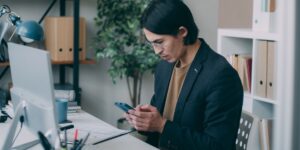 A focused professional working in a home office environment.