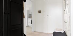 A calm, organized home entryway set up for after-school transitions.