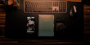 A smartphone face down on a desk at dusk, symbolizing the end of the workday.