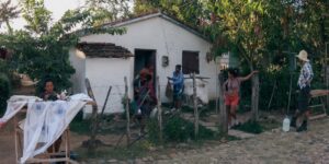 A family holding a weekly governance meeting to organize household chores.